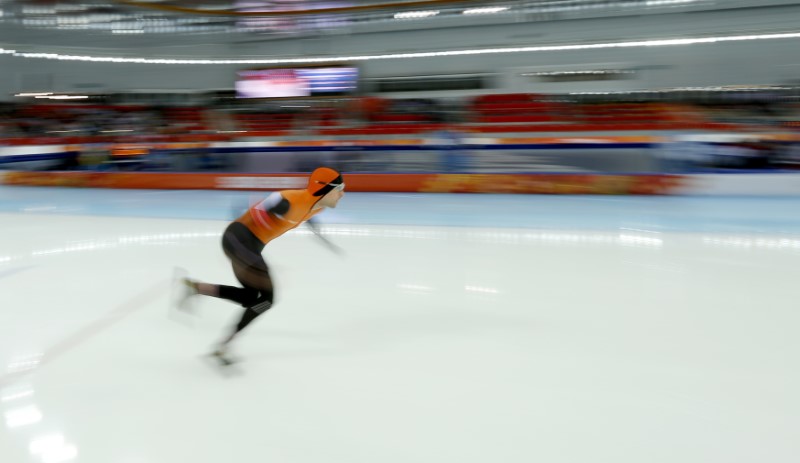 Mark Tuitert of the Netherlands starts as he competes in the men's 1,500 metres speed skating race during the 2014 Sochi Winter Olympics