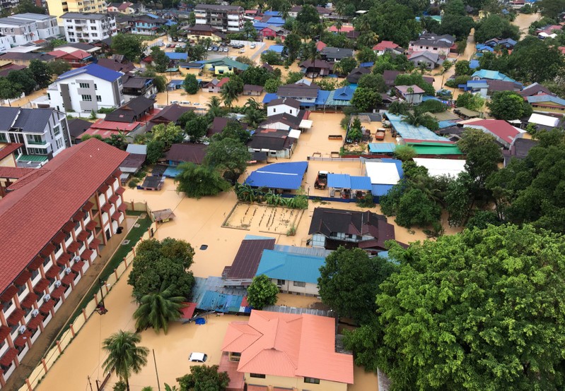 An aerial view shows the flooded residential area in George Town