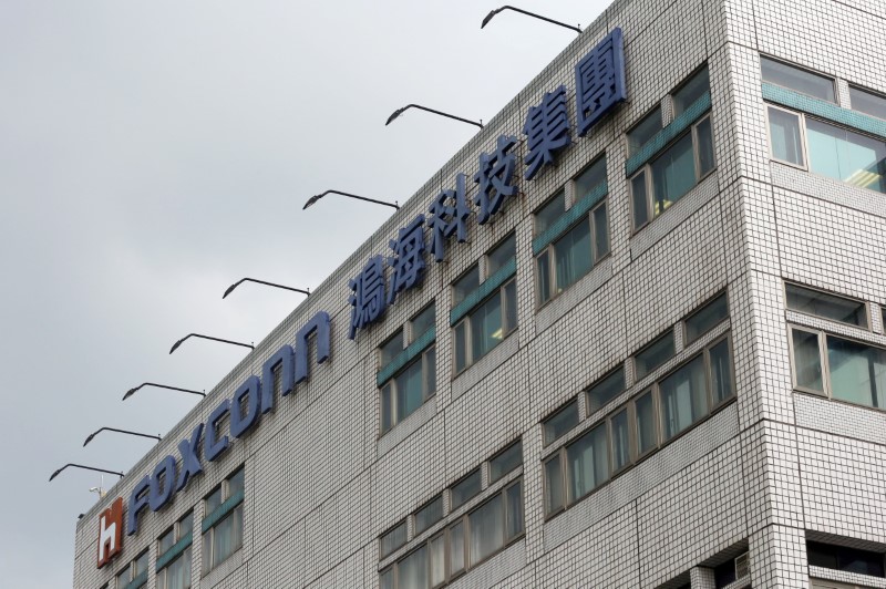 The logo of Foxconn, the trading name of Hon Hai Precision Industry, is seen on top of the company's headquarters in New Taipei City