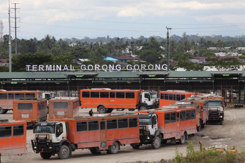 Vehicles used for transporting workers to the Grasberg copper mine operated by Freeport McMoRan Inc are seen at the Gorong-Gorong terminal in Timika, Mimika, Papua province,
