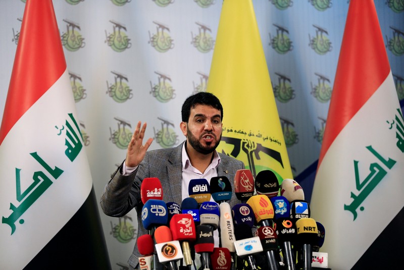 Hashim al-Mousawi, the official spokesman for Harakat Hezbollah al Nujaba speaks, during a news conference in Baghdad