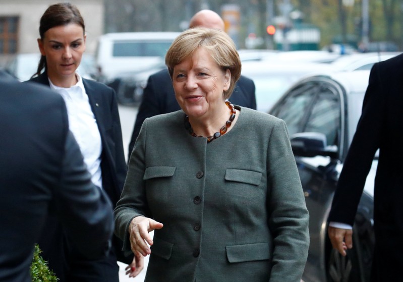 Angela Merkel, leader of the Christian Democratic Union (CDU), arrives at the German Parliamentary Society offices before the start of exploratory talks about forming a new coalition government in Berlin, Germany November 10, 2017