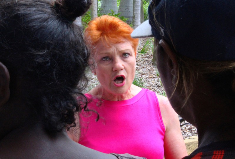 FILE PHOTO: Australian senator Pauline Hanson reacts as she talks with local Aboriginal people in the northern Australian town of Rockhampton in Queensland