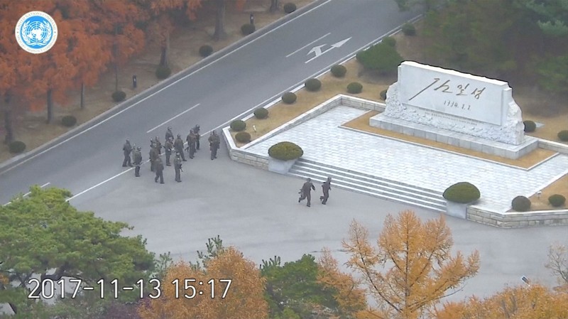 Still image from video shows North Korean soldiers holding rifles and gathering in the North Korean side of the Joint Security Area at the Demilitarized Zone between North and South Korea