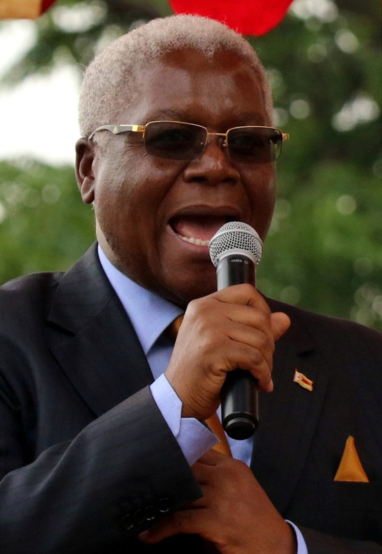 FILE PHOTO: Finance Minister Ignatius Chombo speaks at a rally of the ruling ZANU PF party in Harare