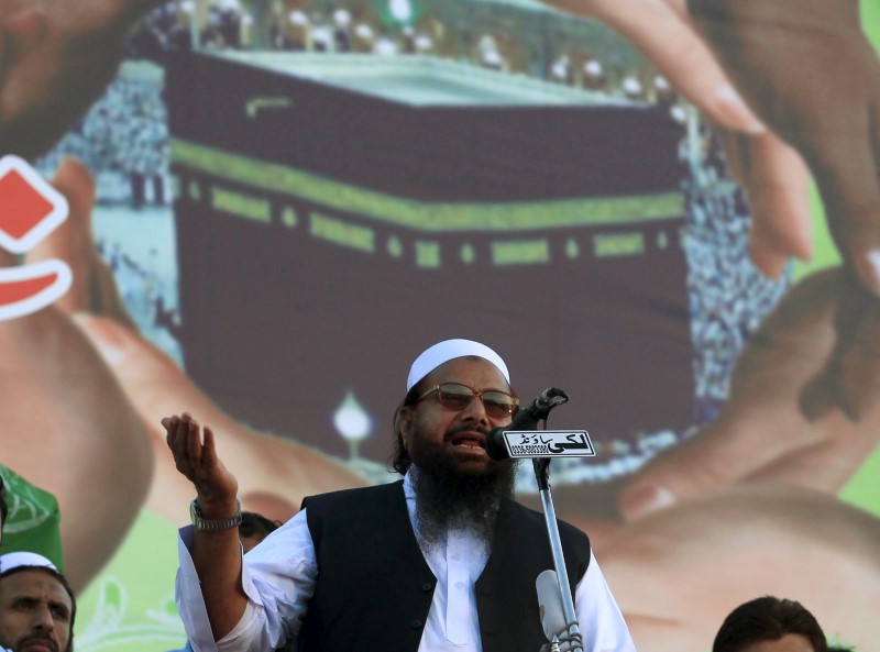Hafiz Saeed, head of the Jamaat-ud-Dawa organisation and founder of Lashkar-e-Taiba (LET), gestures while addressing his supporters during a protest in support of Saudi Arabia over its intervention in Yemen, in Islamabad