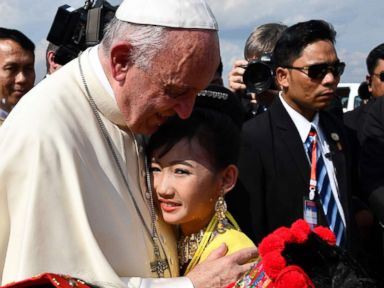 Pope Francis arrives in Myanmar to cheers, Rohingya diplomatic test