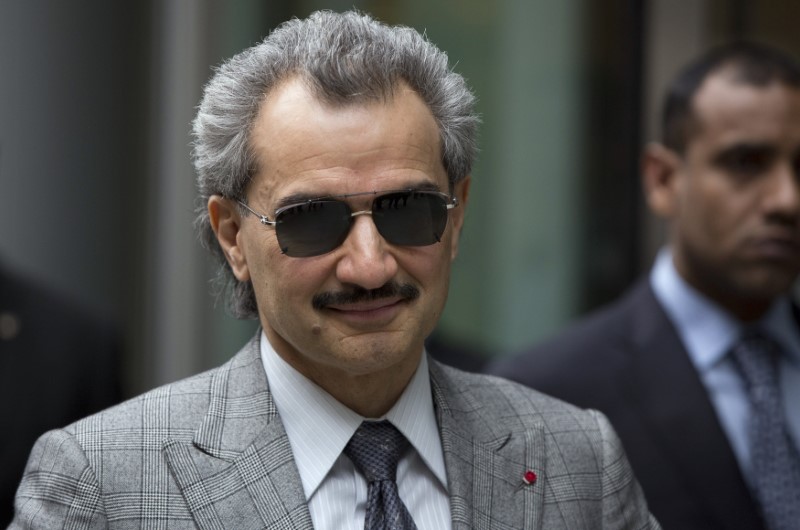 File photograph shows Prince Alwaleed bin Talal leaving the High Court in London