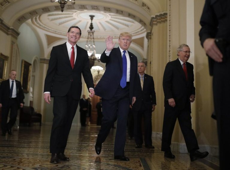 Senate Republicans shove tax bill ahead; spending fight erupts