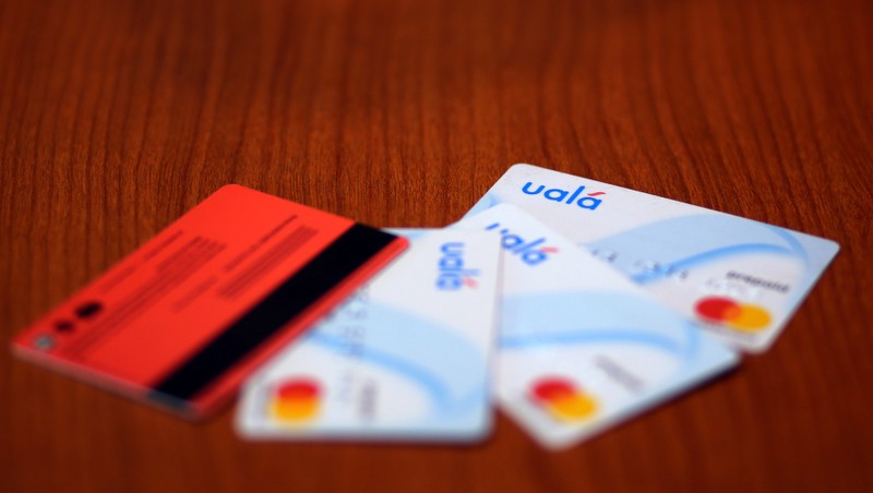 Prepaid credit cards of Argentine mobile banking startup Uala are displayed at the company's offices in Buenos Aires