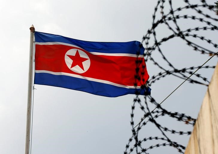 South Korea imposes sanctions on 18 North Koreans, a day before Trump visit