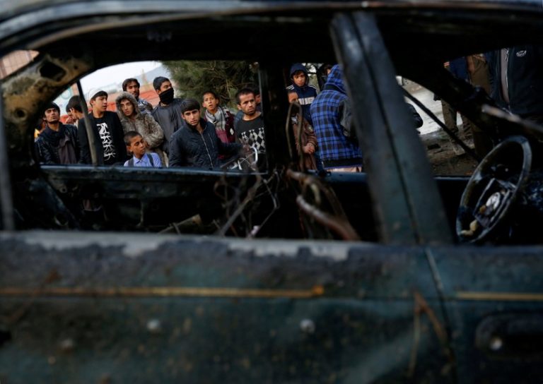 Suicide bomber kills nine near Afghan political meeting