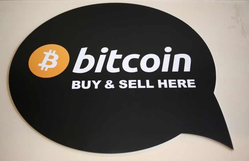 FILE PHOTO: A sign is seen in a restaurant where a Bitcoin ATM is located in Toronto