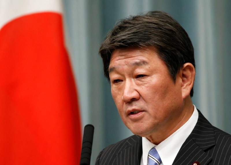 FILE PHOTO: Japan's Economy Minister Toshimitsu Motegi speaks at a news conference in Tokyo