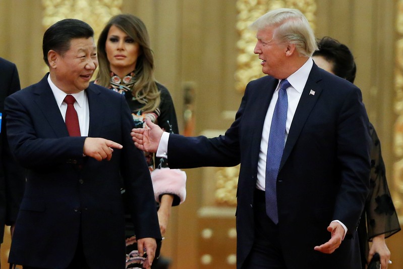 U.S. President Donald Trump and China's President Xi Jinping arrive at a state dinner at the Great Hall of the People in Beijing