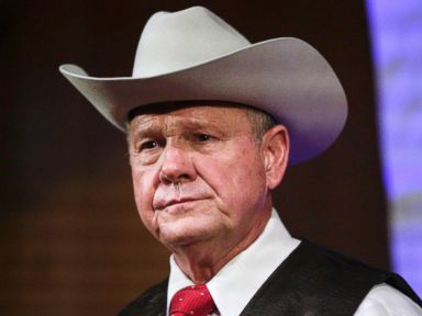 Trump says needs to get back to US ‘to see what’s happening’ with Roy Moore