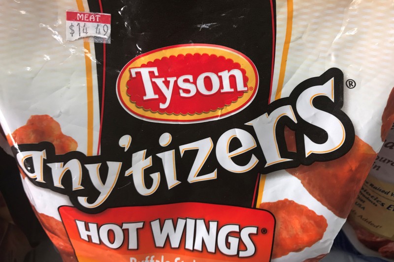FILE PHOTO: Tyson Foods brand frozen chicken wings are pictured in a grocery store freezer in the Manhattan borough of New York City