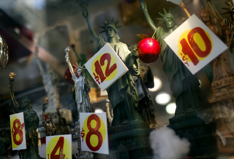Prices are seen on replica Statues of Liberty figures in a shop window in New York City