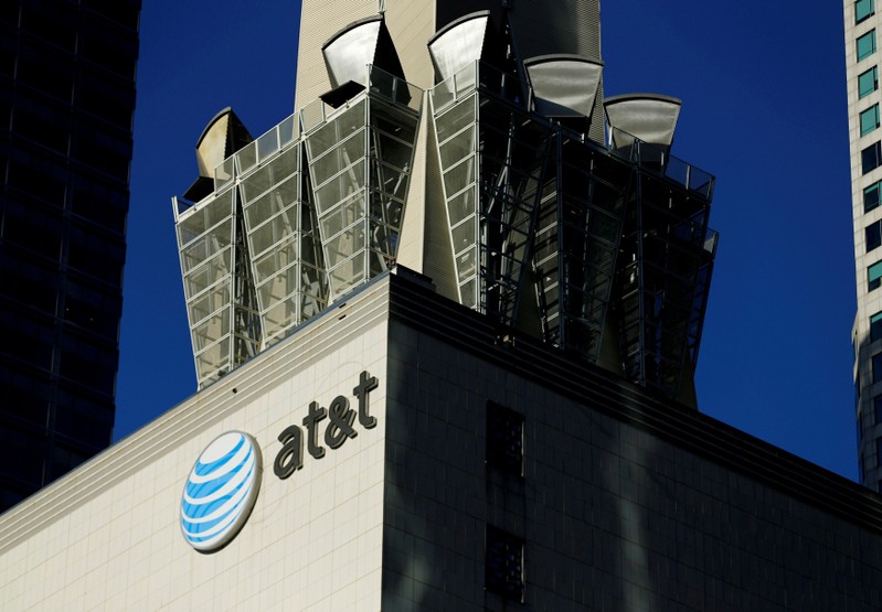 FILE PHOTO: An AT&T logo and communication equipment is shown on a building in Los Angeles
