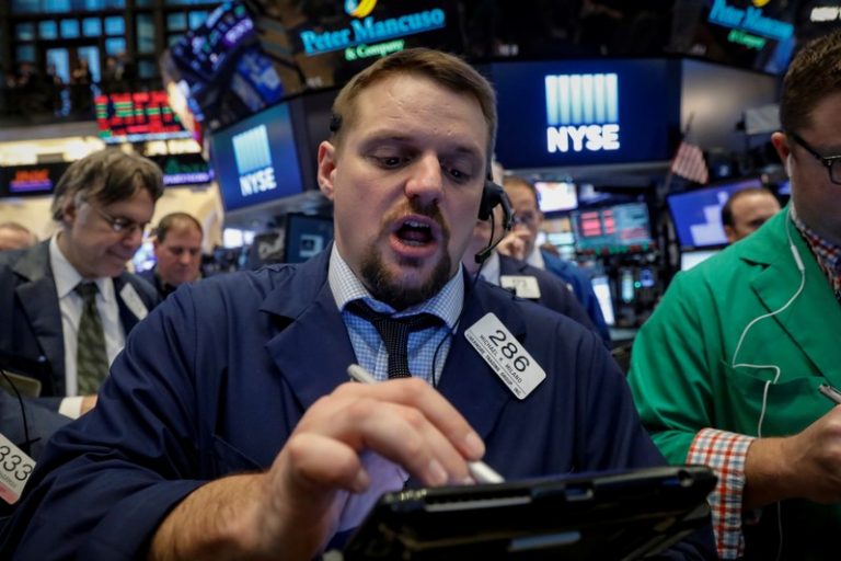 Wall St. flat ahead of holiday; ISPs rise on net neutrality bets