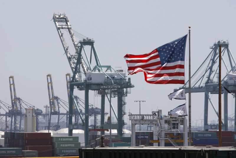 A U.S. flag flies at the Port of Los Angeles in Los Angeles
