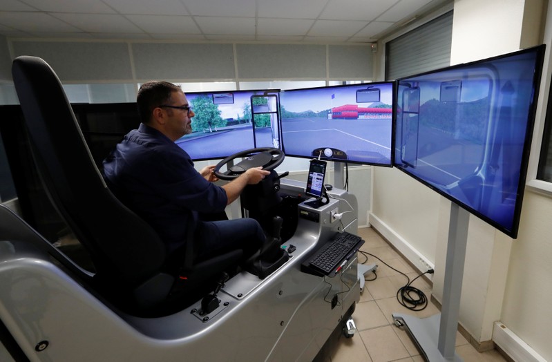 An instructor practices on a truck simulator in ''AFTRAL'', a transport and logistics training centre, in Savigny-le-Temple