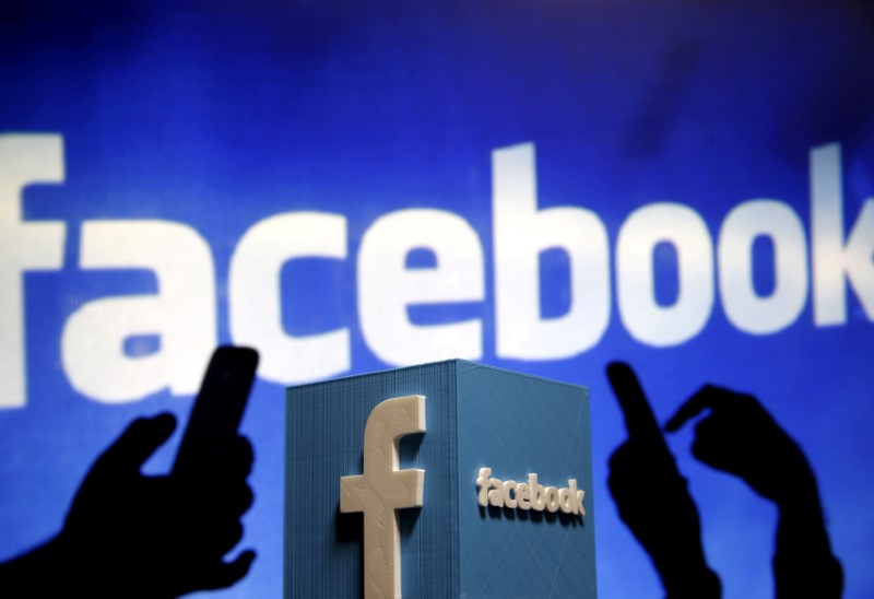 FILE PHOTO: A 3D plastic representation of the Facebook logo is seen in this photo illustration