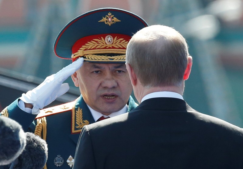 FILE PHOTO: Russian President Putin and Defence Minister Sergei Shoigu attend Victory Day parade to mark end of World War Two at Red Square in Moscow