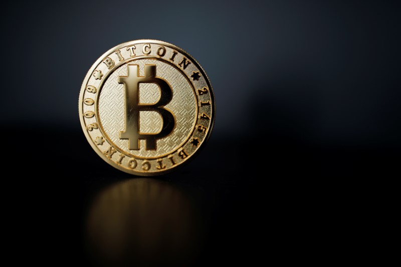 A Bitcoin (virtual currency) coin is seen in an illustration picture taken at La Maison du Bitcoin in Paris