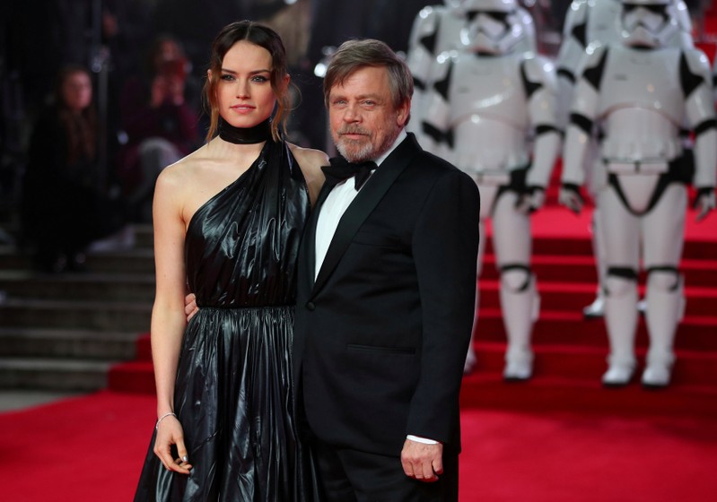 FILE PHOTO: Actors Daisy Ridley and Mark Hamill pose for photographers as they arrive for the European Premiere of 'Star Wars: The Last Jedi', at the Royal Albert Hall in central London