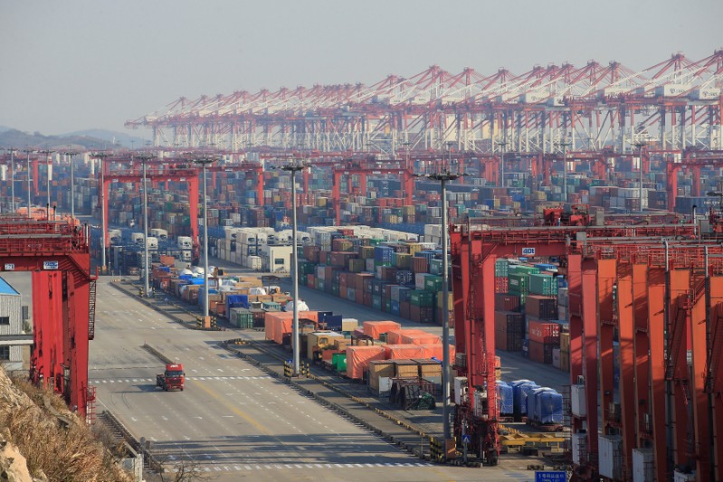 FILE PHOTO: Containers are seen at the Yangshan Deep Water Port, part of the Shanghai Free Trade Zone, in Shanghai