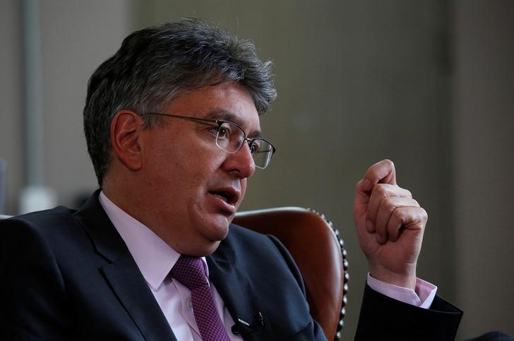 FILE PHOTO: Colombia's Finance Minister Mauricio Cardenas speaks during an interview with Reuters in Bogota