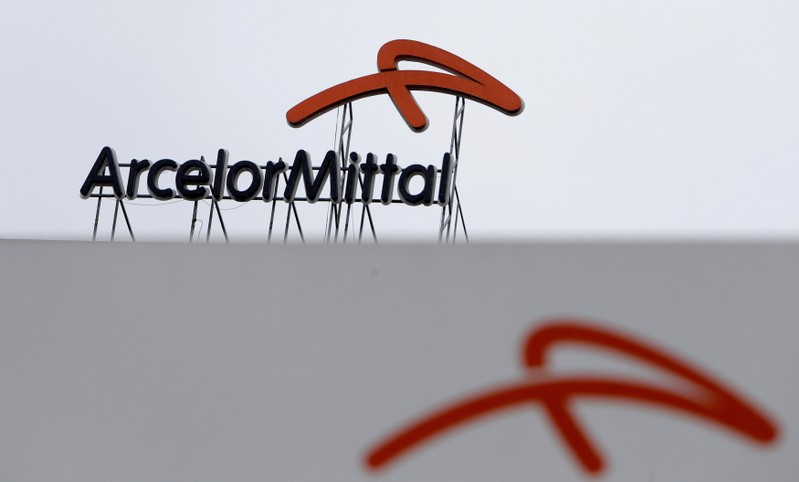 FILE PHOTO: A logo is seen on the roof of the ArcelorMittal steelworks headquarters in Ostrava