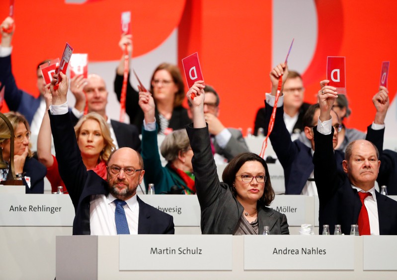 Social Democratic Party (SPD) delegates vote to enter talks with Chancellor Merkel's conservatives on negotiating a government, during an SPD party convention in Berlin