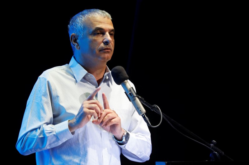 Israeli Finance Minister Moshe Kahlon gestures as he speaks at an event in Ofakim
