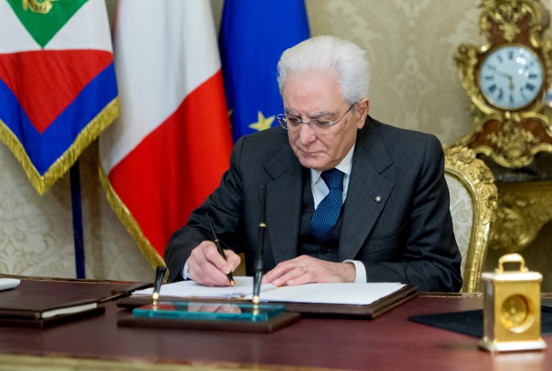 FILE PHOTO: Italian President Mattarella signs a decree to dissolve parliament at the Quirinale Presidential palace in Rome