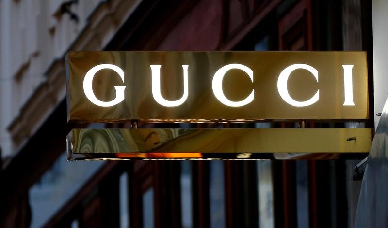 FILE PHOTO: A company logo is pictured outside a Gucci store in Vienna