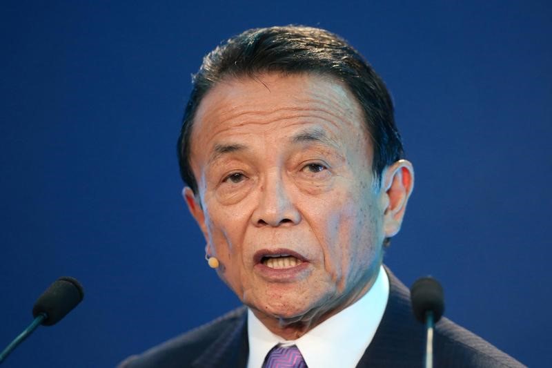 FILE PHOTO: Taro Aso, Deputy Prime Minister, Minister of Finance and Minister of State for Financial Services of Japan, speaks during the Milken Institute Global Conference in Beverly Hills