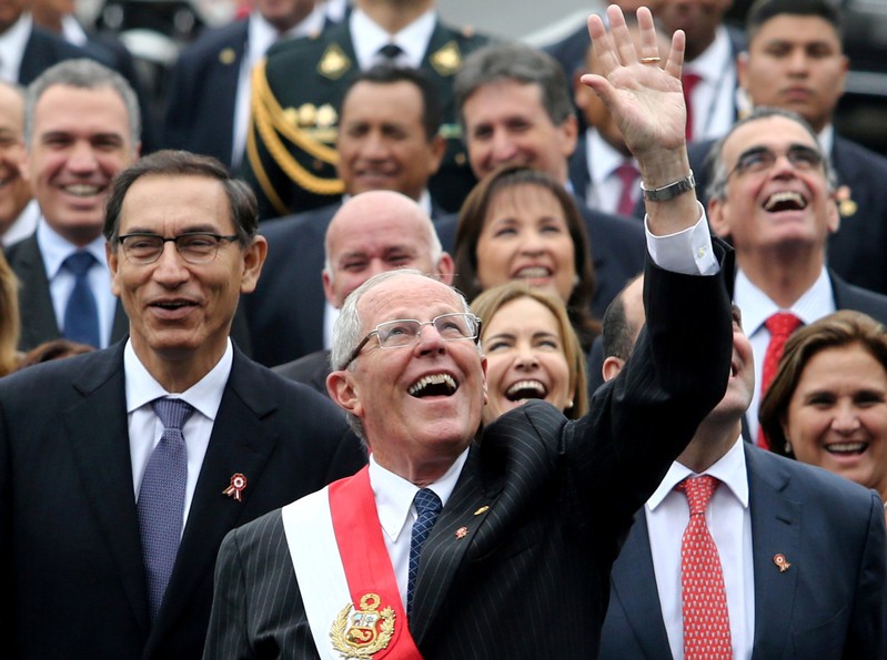 FILE PHOTO: Peru's President Pedro Pablo Kuczynski accompanied by Vice-President Martin Vizcarra walks to the Government Palace during celebrations of Independence Day, in Lima