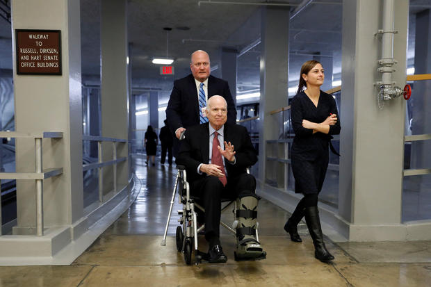 McCain hospitalized for side effects of cancer treatment, office says