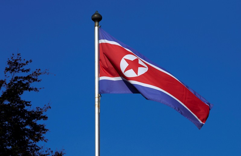 FILE PHOTO - A North Korean flag flies on a mast at the Permanent Mission of North Korea in Geneva
