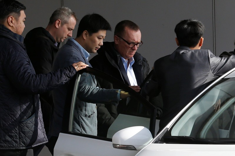United Nations political affairs chief Jeffrey Feltman arrives at Beijing airport after his return from North Korea