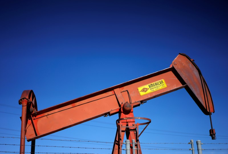 An oil well pump jack is seen at an oil field supply yard near Denver