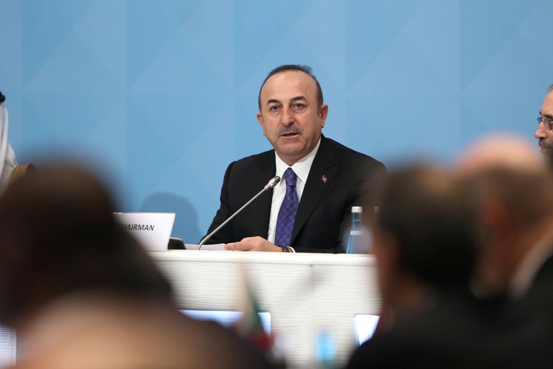 Turkish Foreign Minister Cavusoglu speaks during a meeting of the OIC Foreign Ministers Council in Istanbul