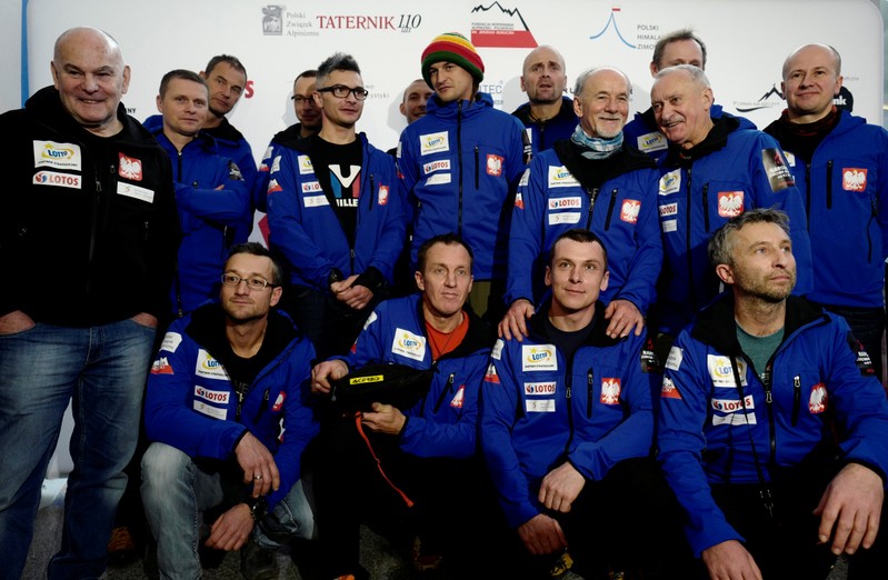 Polish mountaineers pose for a team photo prior their departure for the expedition to scale K2 in the winter, at an airport in Warsaw