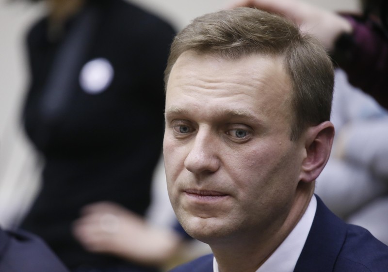 FILE PHOTO: Russian opposition leader Alexei Navalny submits his documents to be registered as a presidential candidate at the Central Election Commission in Moscow