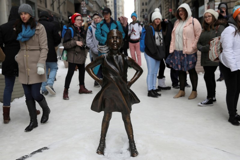 FILE PHOTO - The 'Fearless Girl' statue which stands in front of Wall Street's Charging Bull statue is seen in New York