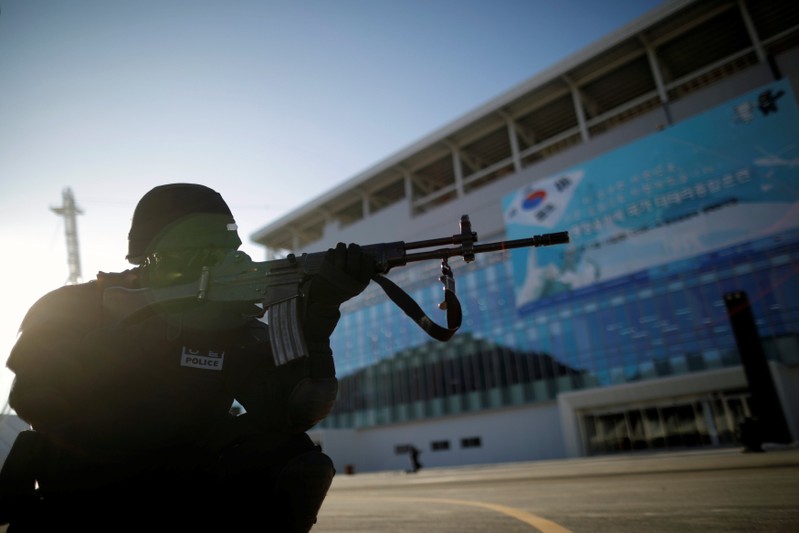 Police officer takes part in a security drill ahead of the 2018 Pyeongchang Winter Olympic Games in Pyeongchang