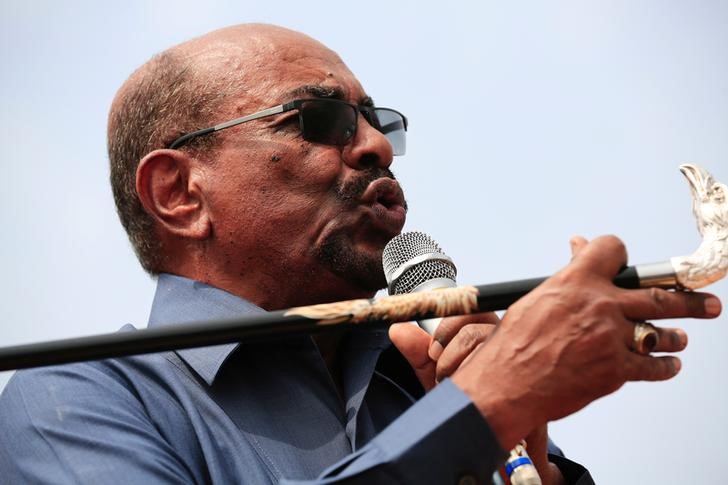 Sudan's President Omar al-Bashir addresses supporters during his visit to the war-torn Darfur region, in Bilal