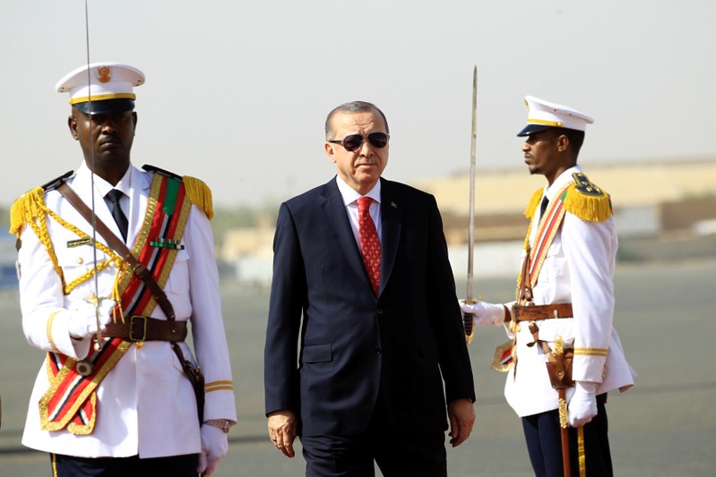 TurkeyÕsÊPresidentÊRecep Tayyip ErdoganÊinspect honor guard during arrival at Khartoum Airport